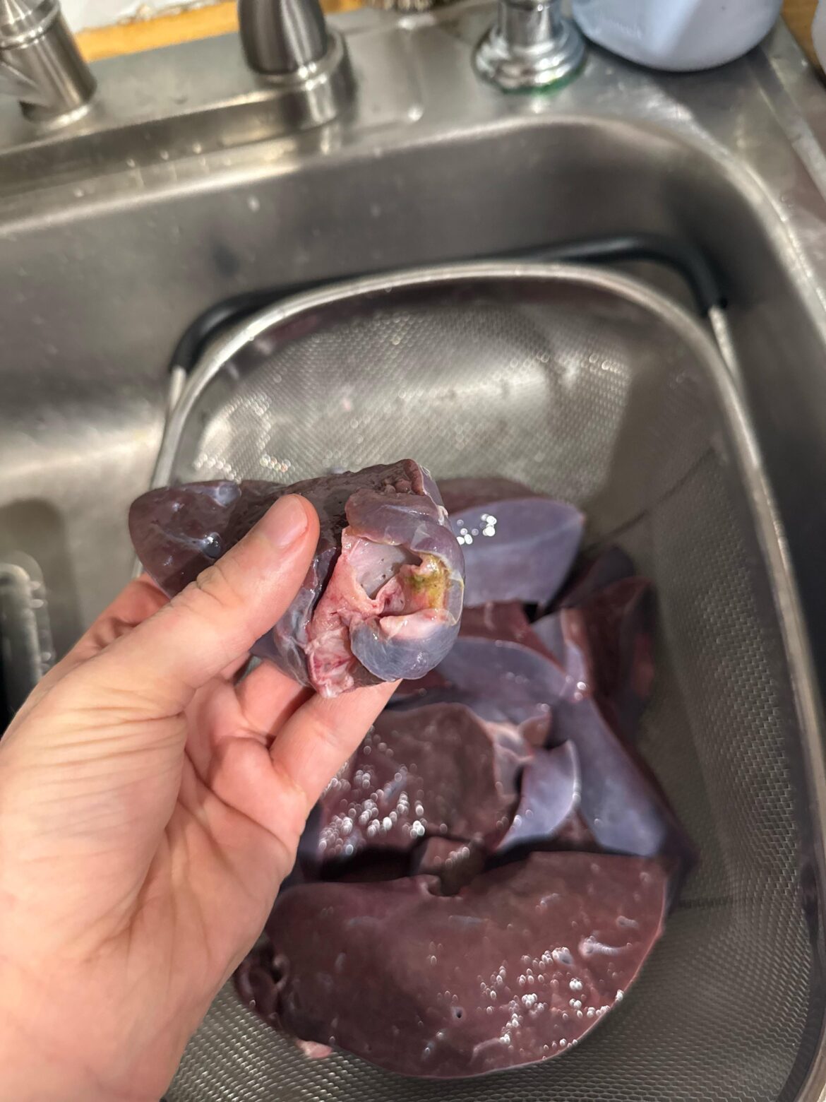 Nasty green bit on deer liver after soaking in milk
