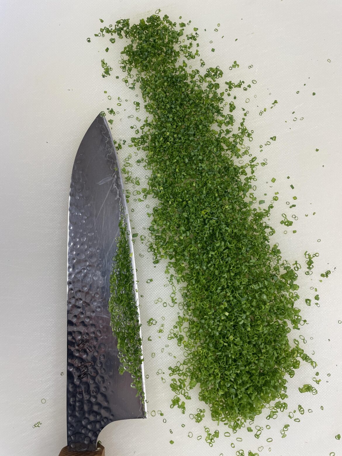 Cutting a couple of chives almost every day until this Reddit says they’re perfect. Day 57