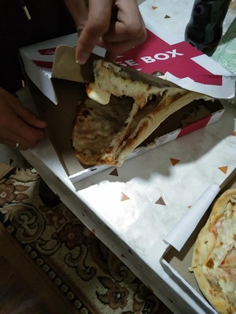 Merry Christmas, ya filthy animals! Featuring a Kyrgyzstan pizza delivery