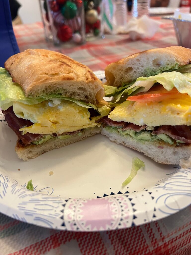 Christmas Eve Breakfast Sandwich! Bacon , eggs and lettuce and tomato and avocado