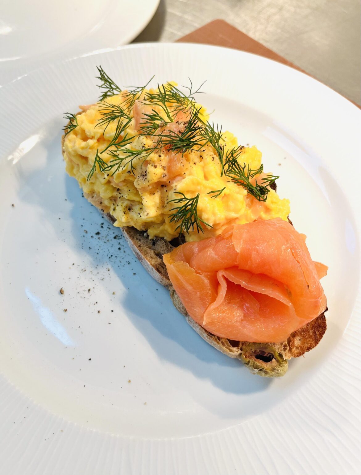 [pro/chef] Smoked salmon and scrambled egg on sourdough toast.