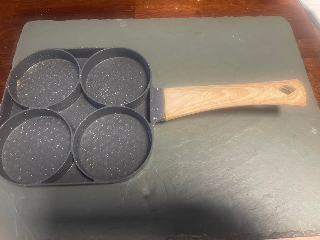 Love this egg pan got here in Asia. $7. Extremely non-stick. Doesn’t feel like Teflon. Eggs pop right out.