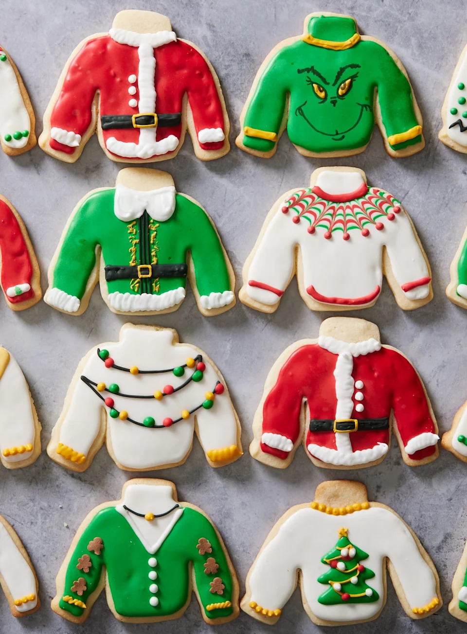 sugar cookies decorated with icing to look like ugly christmas sweaters