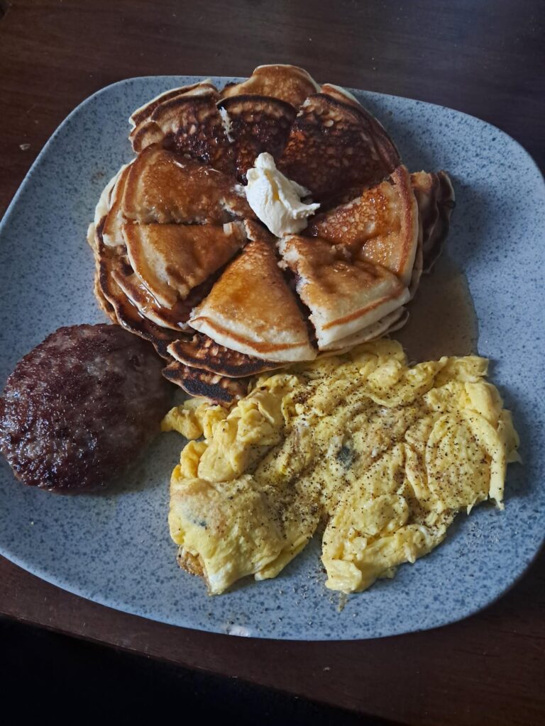 Just a simple breakfast today. Chocolate chip pancakes, sausage and eggs.