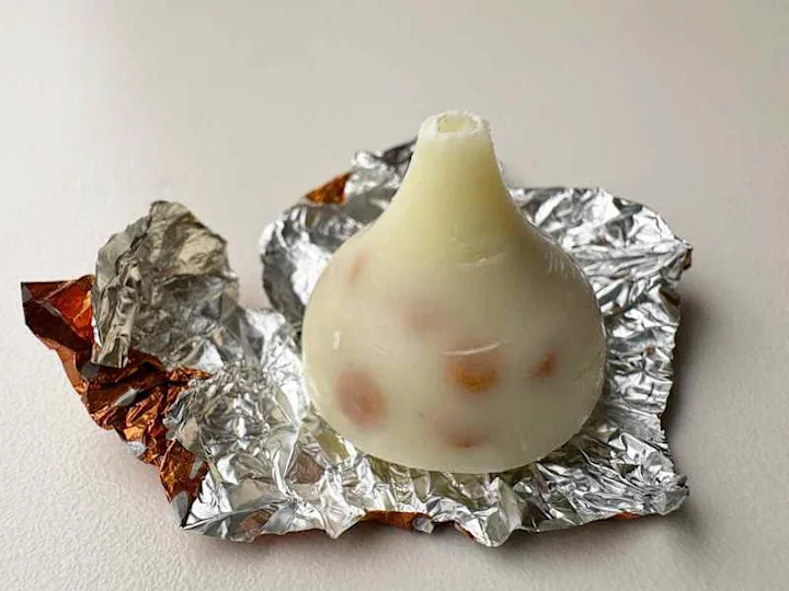 Snickerdoodle Hershey kisses taken our of wrapper.