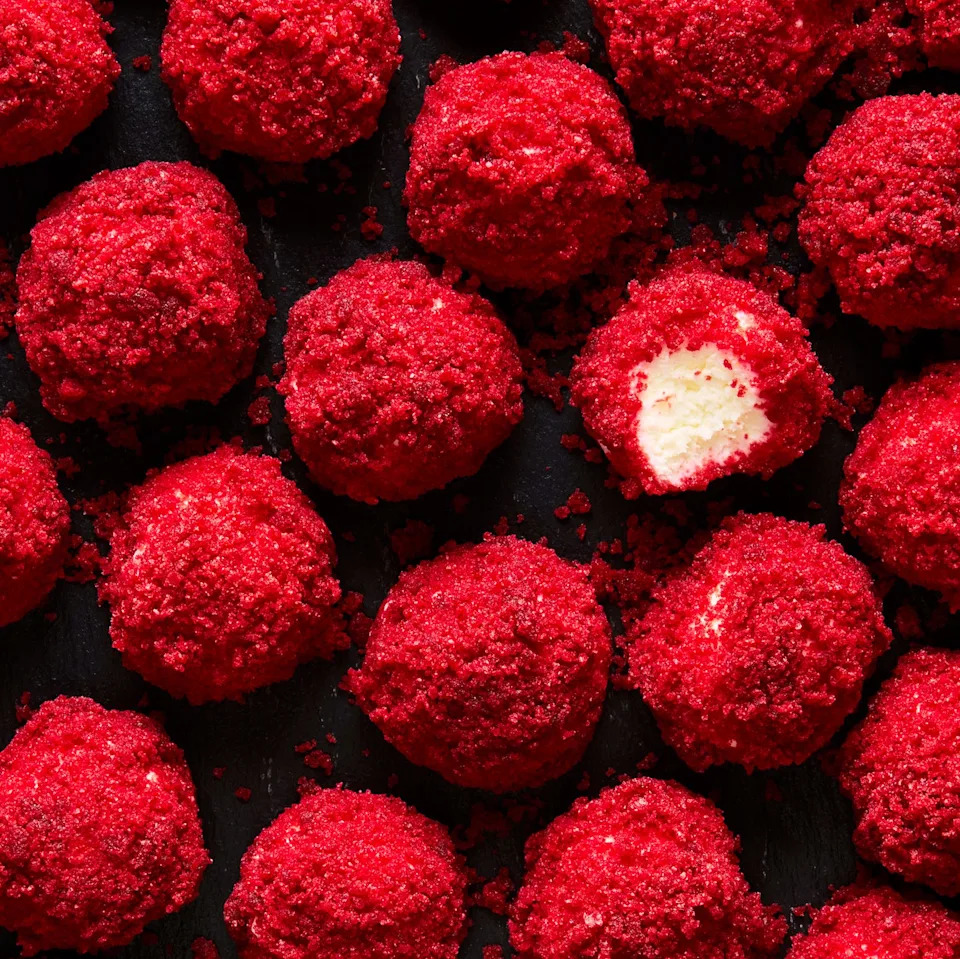cheesecake bites rolled in red velvet cake pieces