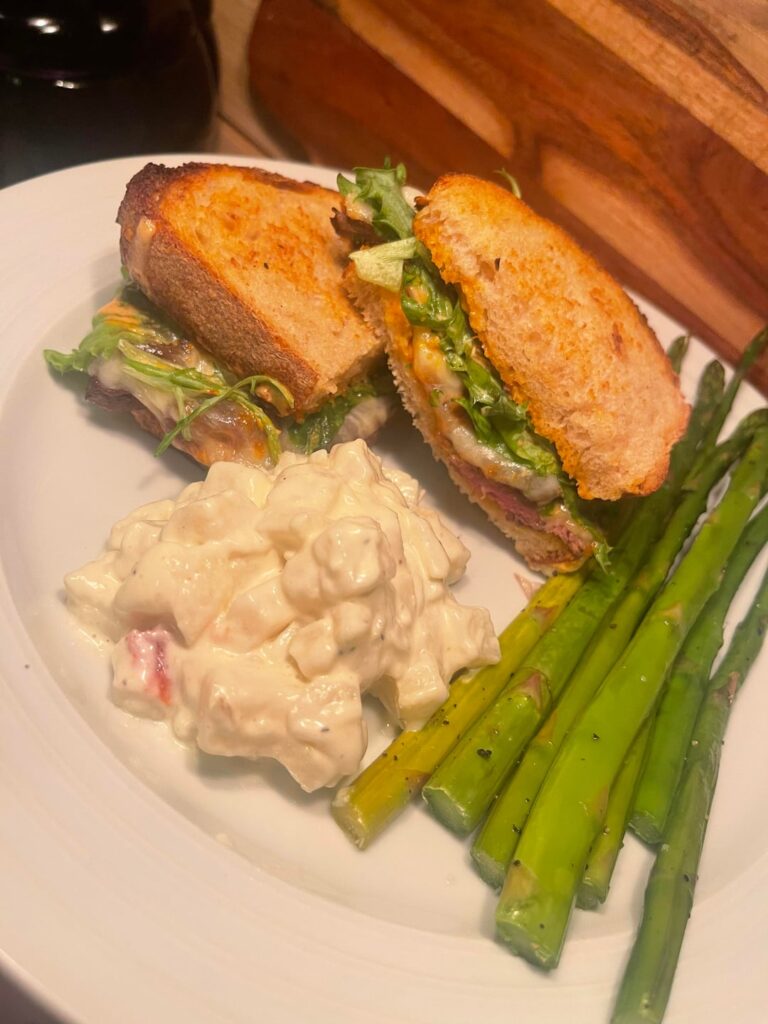 Steak sandwiches with chipotle mayo and caramelized onions on Zingerman’s sourdough