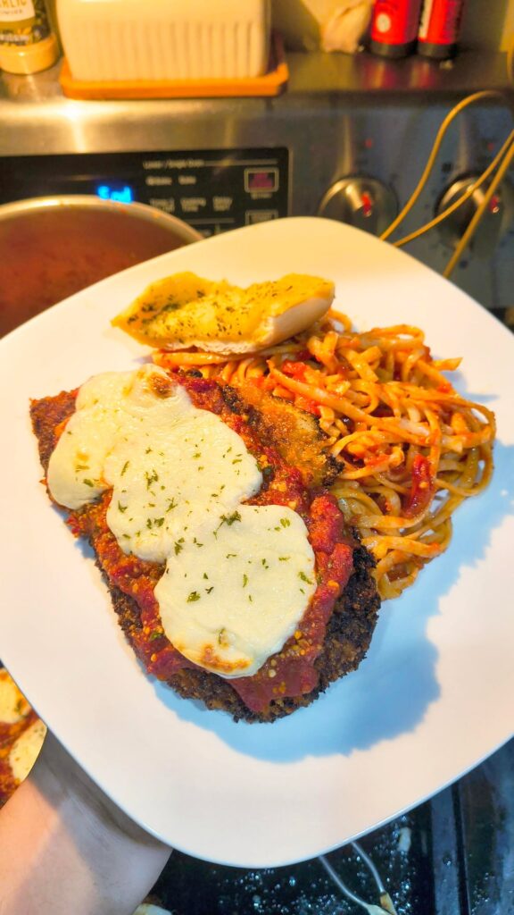 Chicken Parm and linguine w/homemade Marinara from San Marzanos