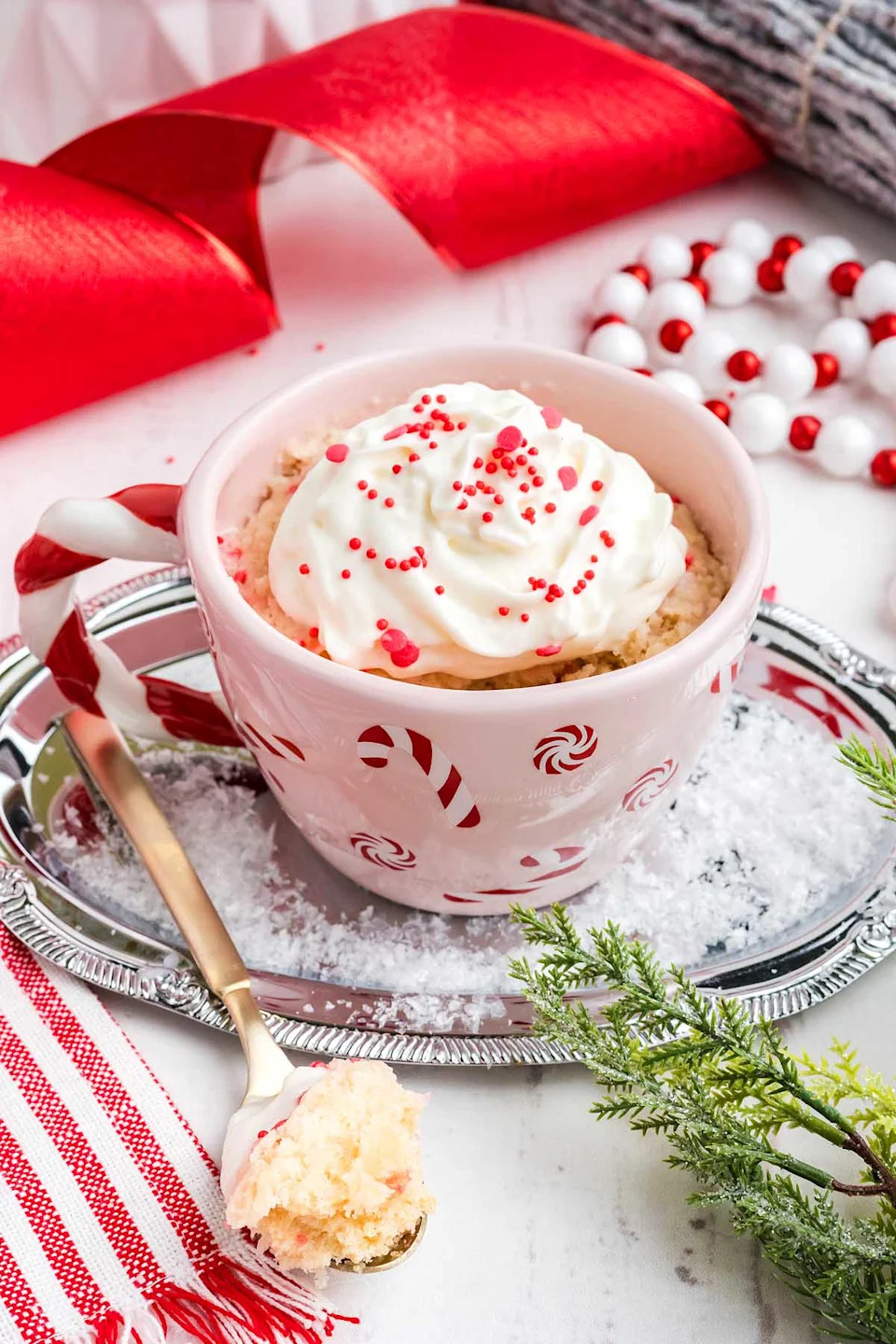 A close up shot christmas mug cake.
