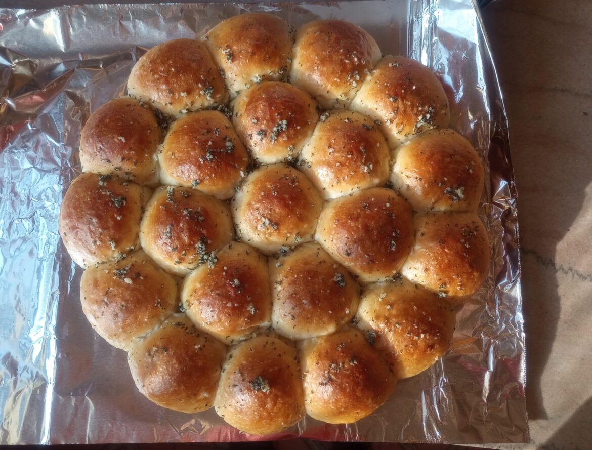 Rosemary garlic pull apart dinner rolls - modified Claire Saffitz recipe, cooked in cast iron