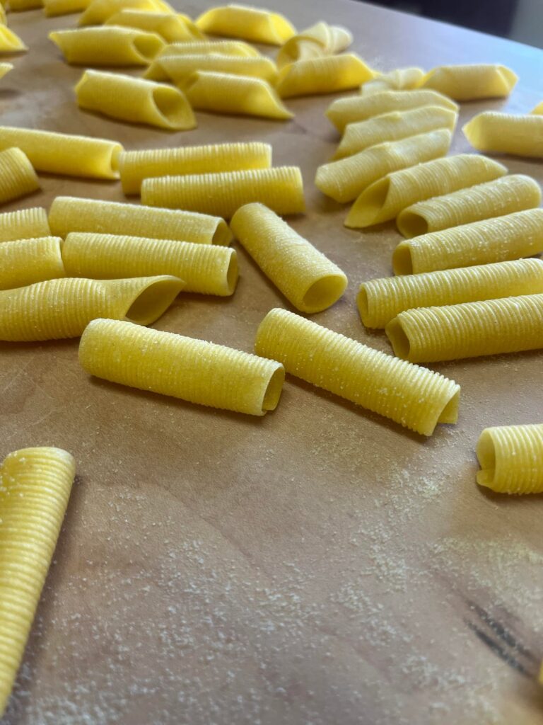 Garganelli and Maccheroni al pettine with a butter sauce, black pepper, and pecorino