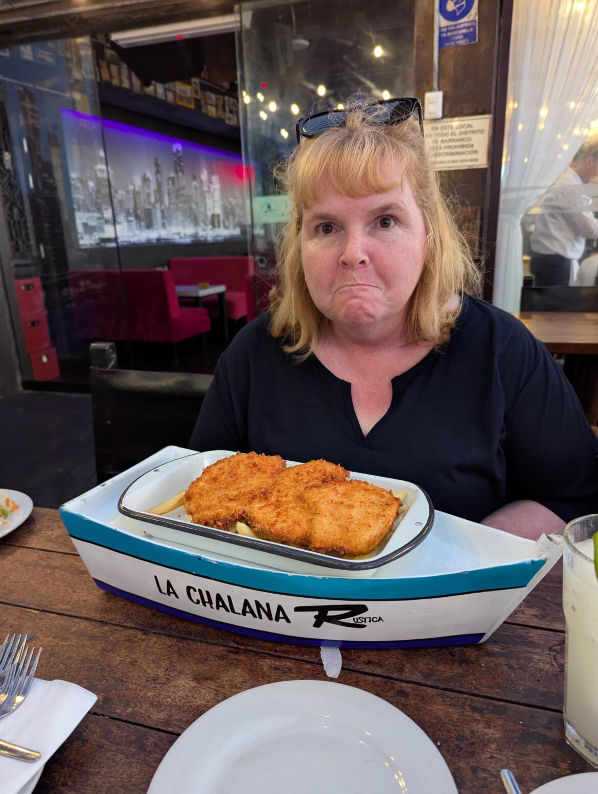 Chicken and chips in a boat