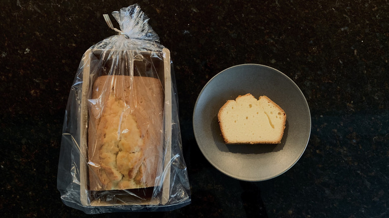 Pavilions In-Store Pound Cake slice on a plate with packaged loaf