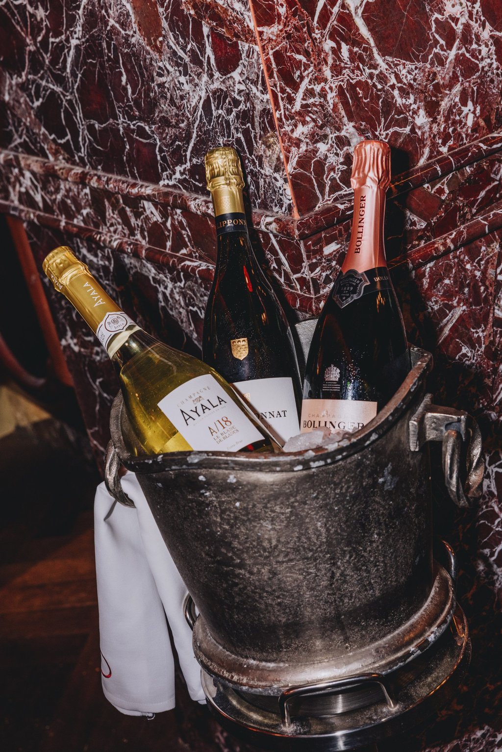 Bottles of Champagne at Jean-Pierre, where every night’s a party. Photo: Jocelyn Tam