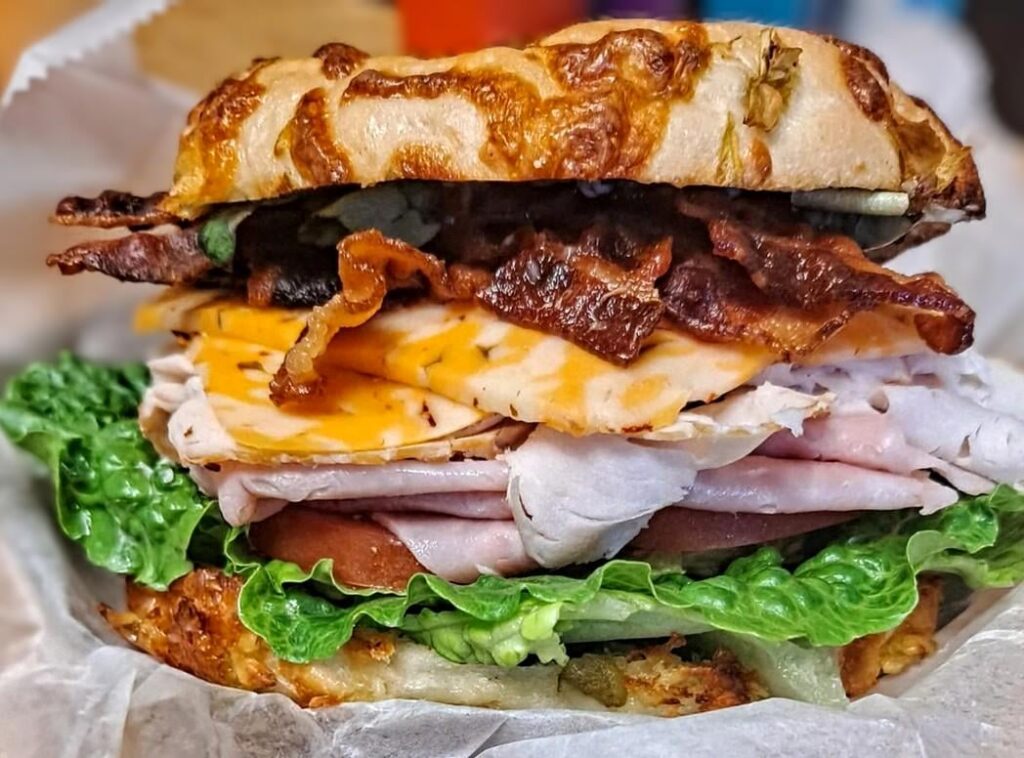 The club with 3 pepper colby jack, pesto and fresh basil.