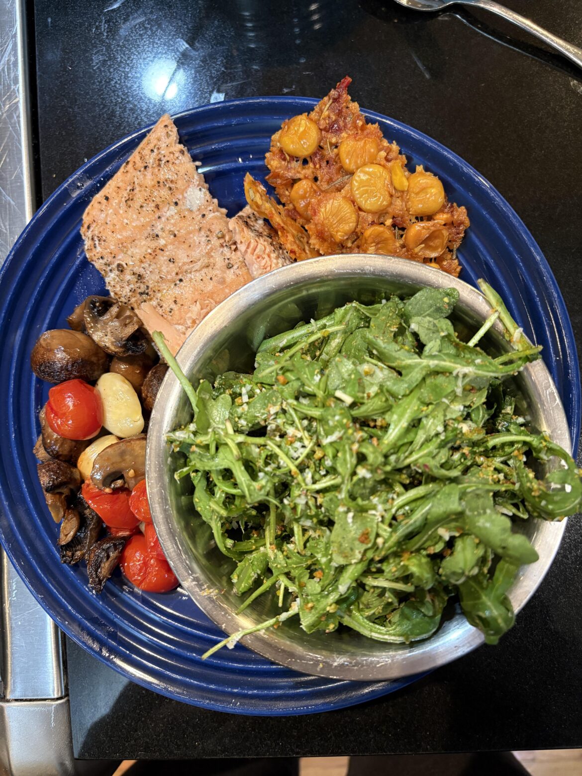Dinner: Salmon, arugula pistachio salad, roast mushrooms and tomatoes, & lupini bean crackers