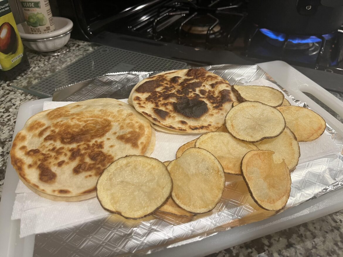 Quesadilla and a side of hand cut potato fries.