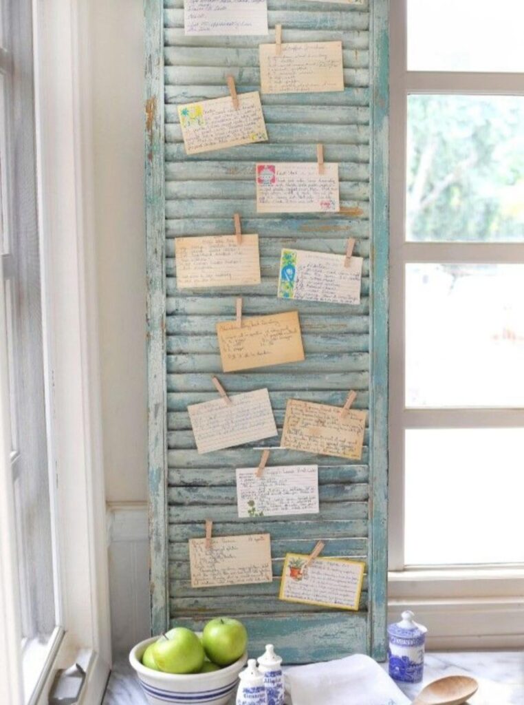 Here's a fun wait to display vintage recipe cards handed down inthe family. Use an old shutter and mini clothespins.