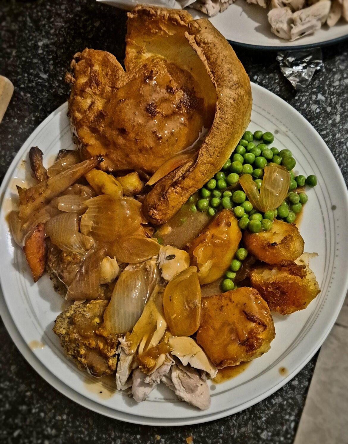Maybe not best presented, but: Yorkshire, Chicken with herb & garlic butter under skin on a trivet of mixed veg, honey toasted carrots & parsnips, peas, roast potatoes in beef dripping & gravy made from the chicken & veg juices with onions.