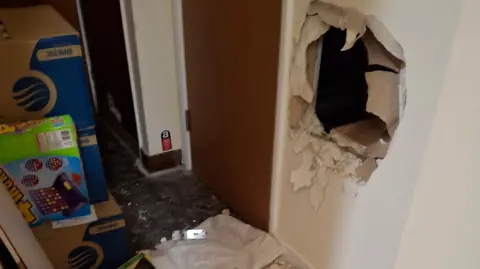 Ladybrook Friends Foodshare Hole in the wall at the food bank.