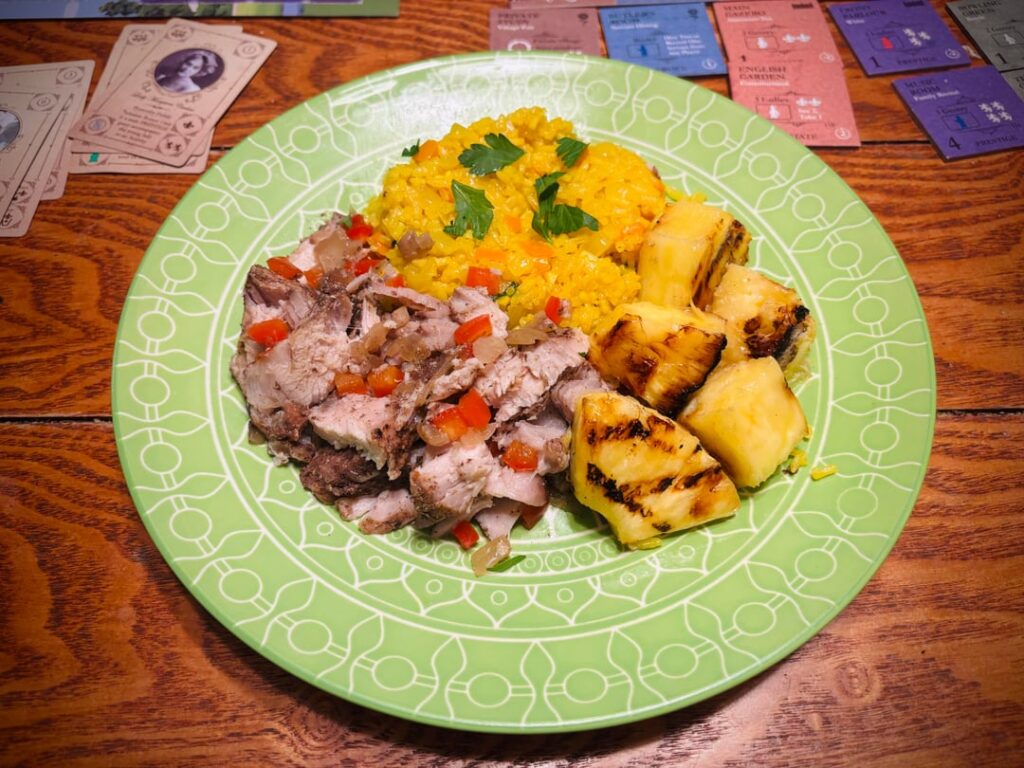 Caribbean country pork ribs with yellow rice and grilled pineapple