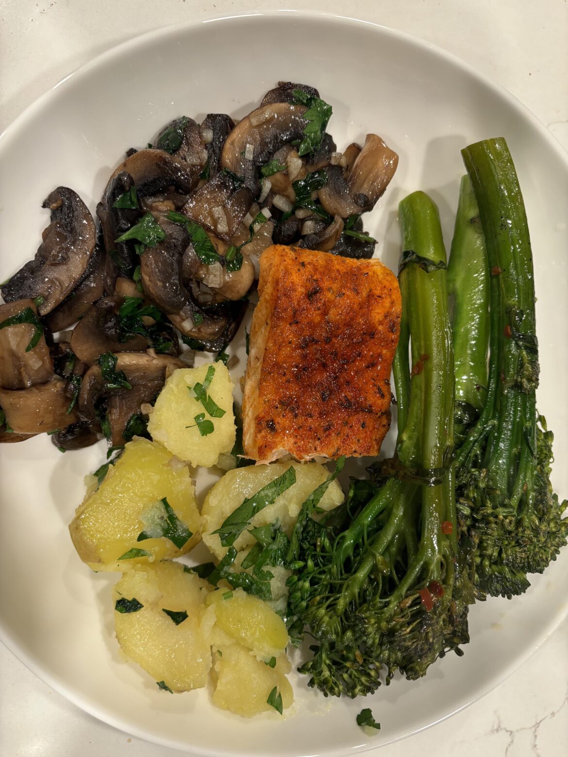 Salmon, broccolini, mushrooms, potatoes