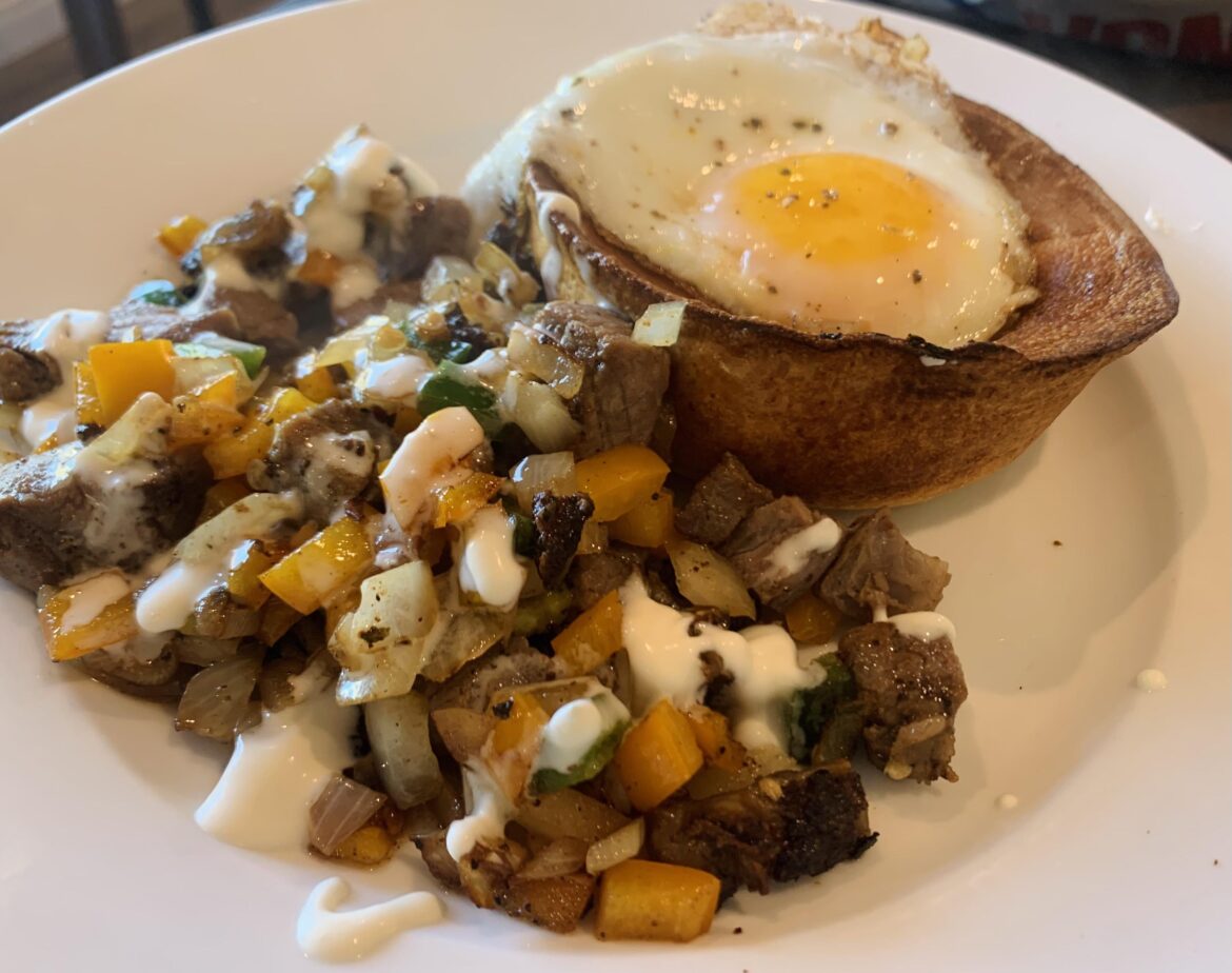 Xmas leftovers: roast beef hash with creamy horseradish and a fried egg in a yorkie.