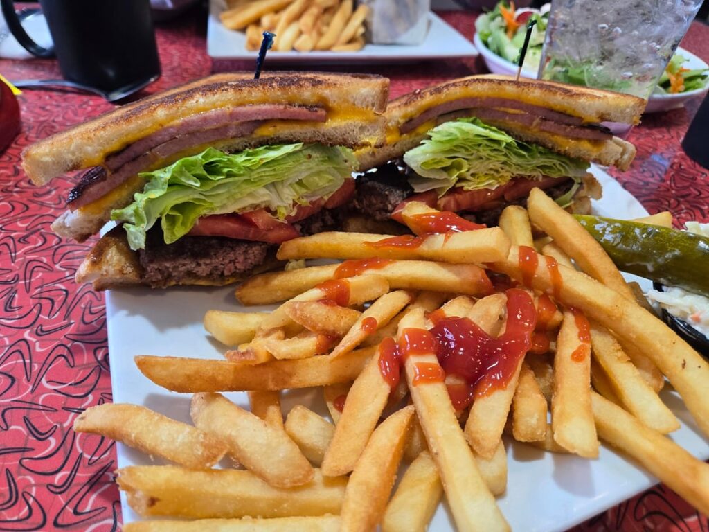 Burger w grilled cheese and taylor ham sandwiches for buns at the local diner