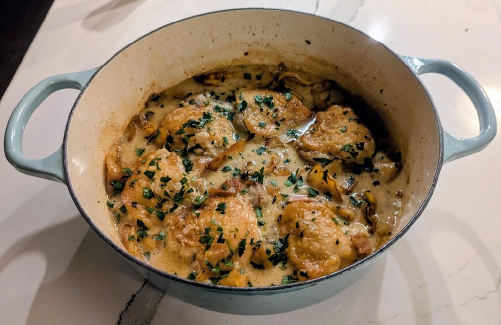 French chicken casserole (Poulet a la Normande) with Michelin potato puree and sauteed spinach 😋