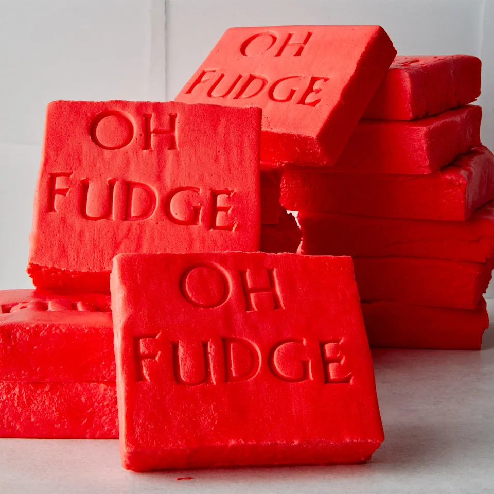 red fudge shaped like soap with the words oh fudge