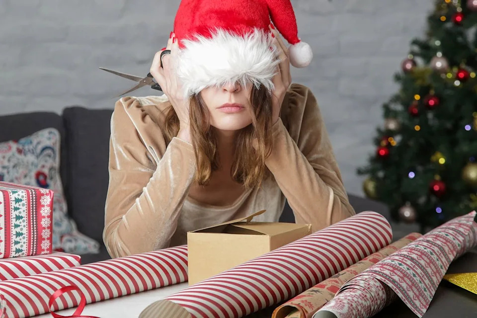 Getty Stressed woman during Christmas (stock photo)