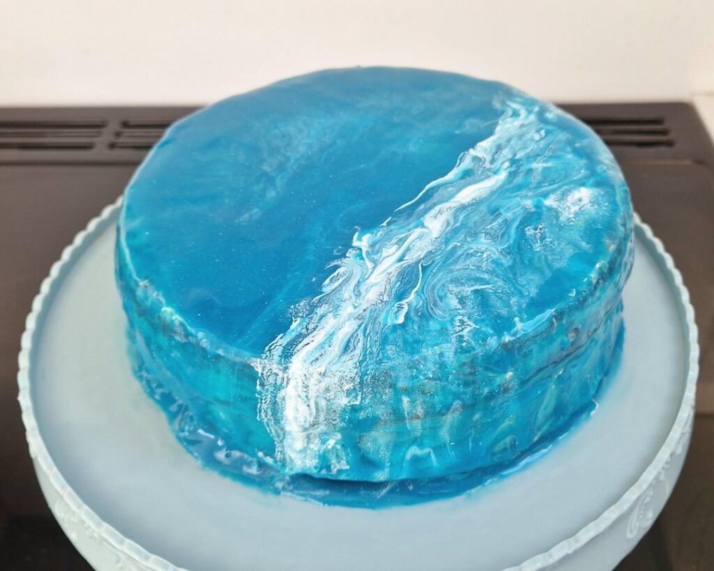 I tried to disguise my chocolate cake as the ocean with a mirror glaze