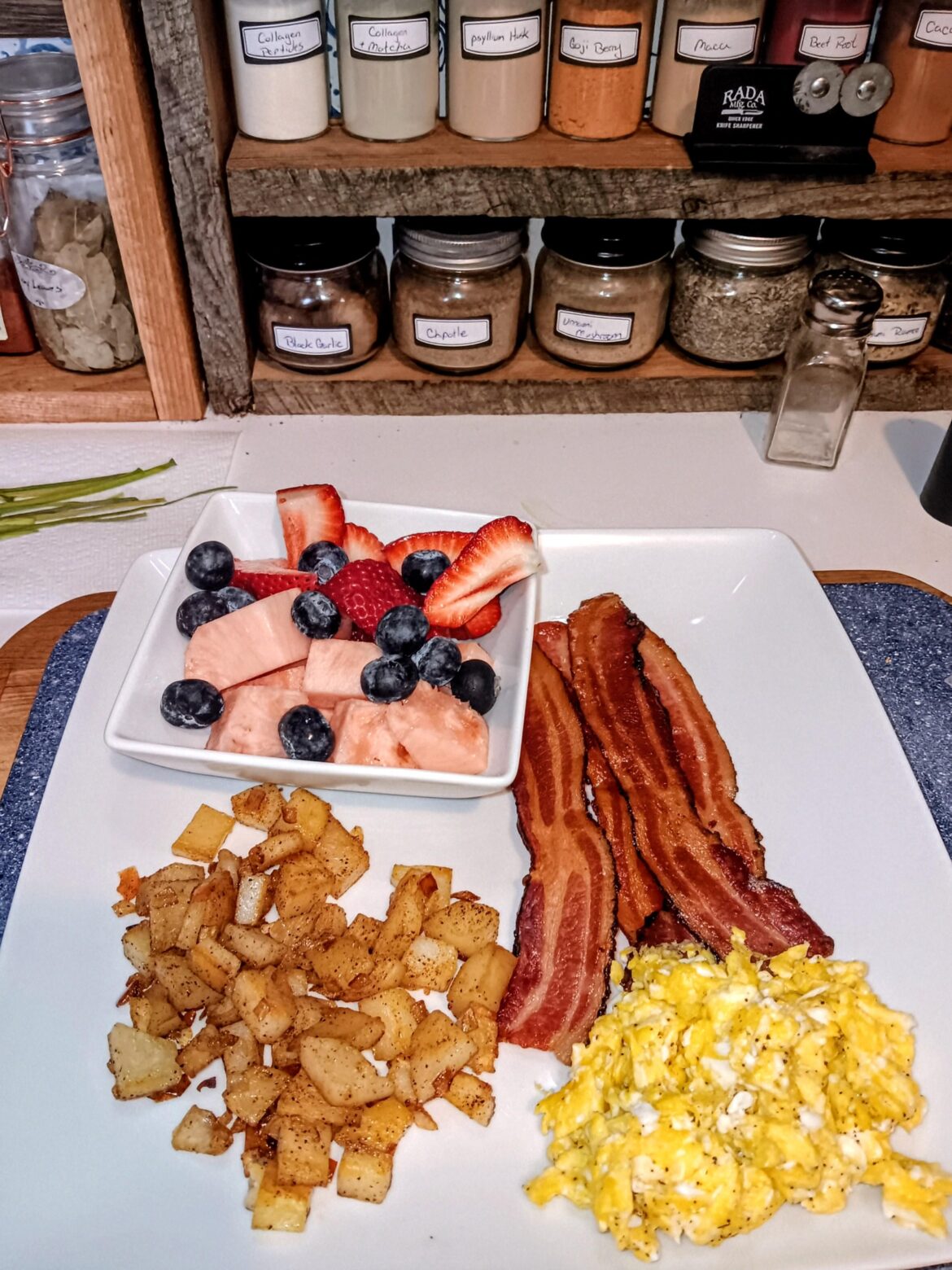 Today's breakfast...bacon, home fries, feta scrambled eggs and fruit.
