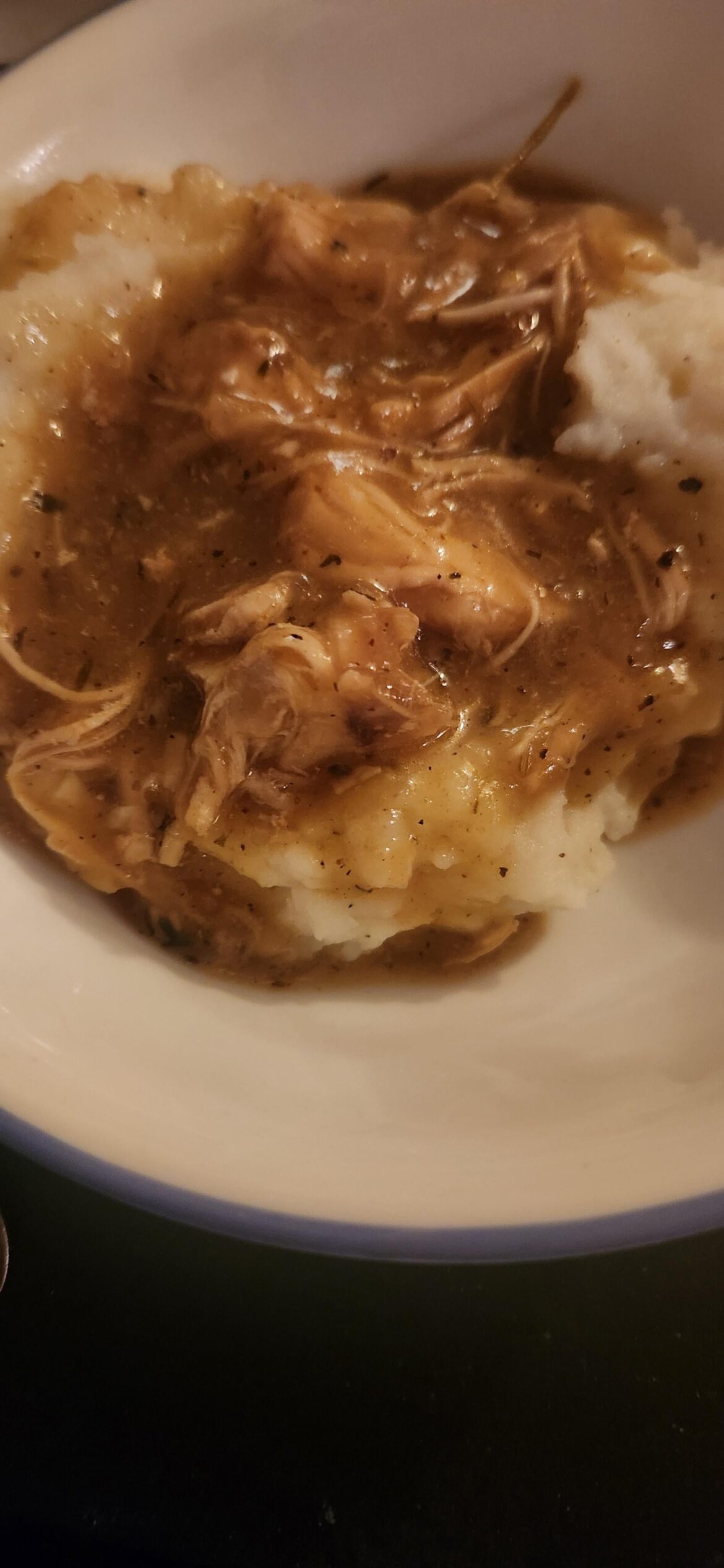 Mashed potatoes and chicken gravy.
