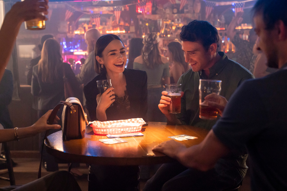 Lily Collins as Emily and Bryan Greenberg as Jake Campbell in ‘Emily in Paris’ Season 5.