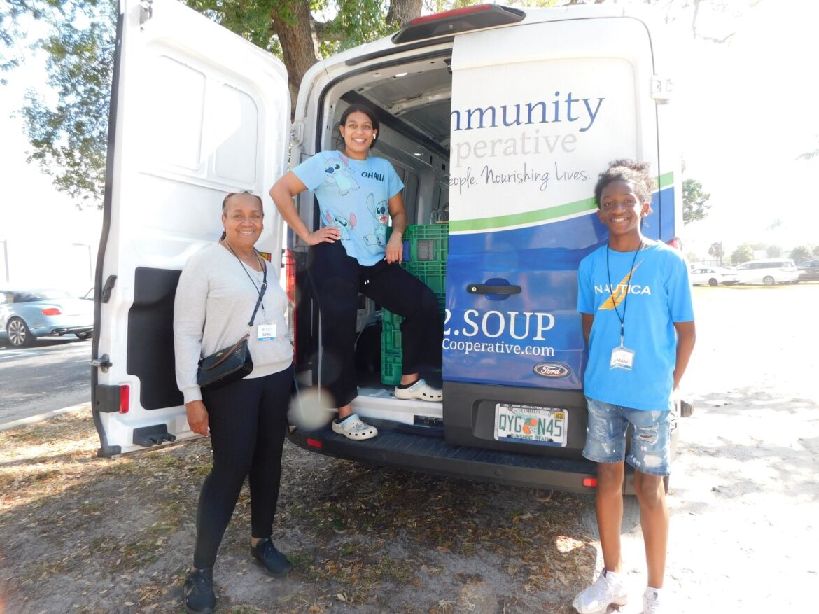 Christmas Carol Sing raises food for Community Cooperative