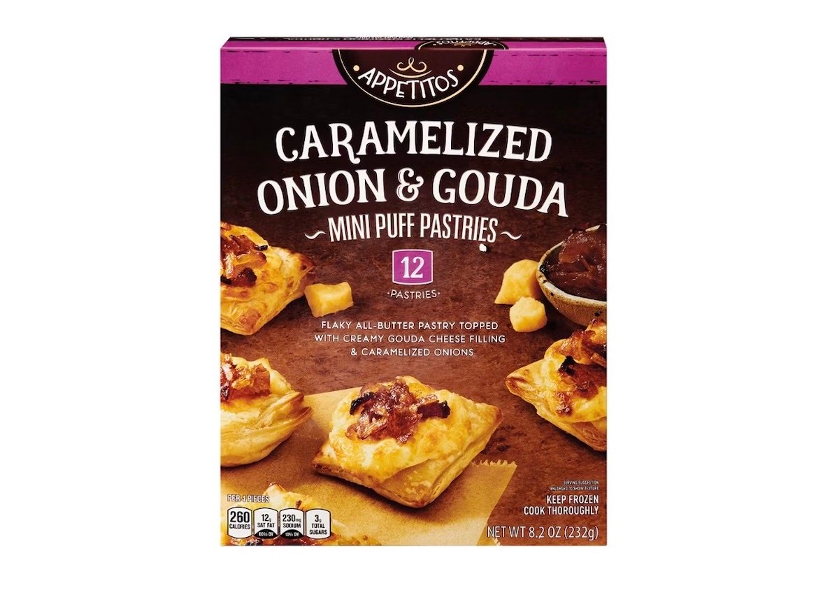 A box of Appetitos Caramelized Onion & Gouda Mini Puff Pastries, featuring images of the pastries with caramelized onions and cheese on the front. The box contains 12 pastries and weighs 8.2 oz (232g).