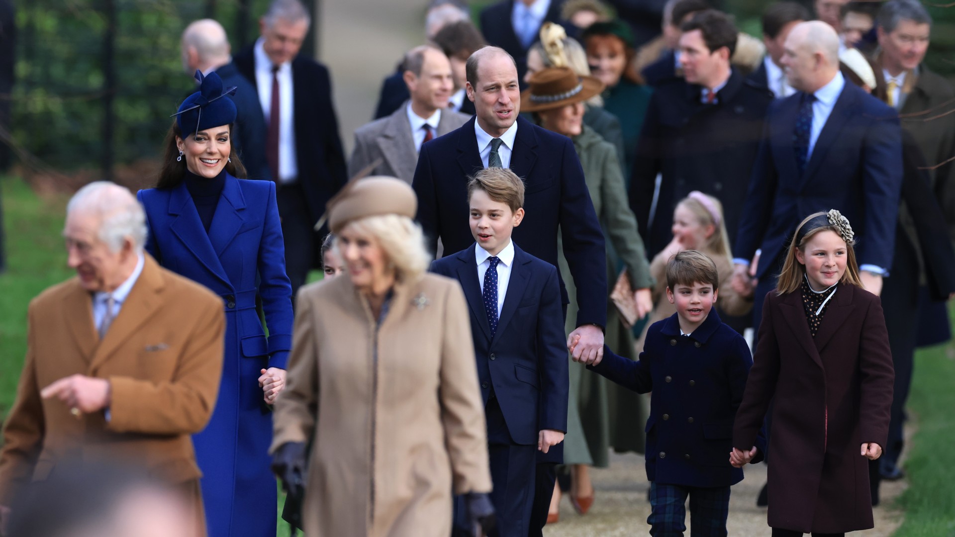 (L-R) King Charles III, Catherine, Princess of Wales, Queen Camilla, Prince George, Prince William, Prince of Wales, Prince Louis and Mia Tindall attend the Christmas Morning Service at Sandringham Church on December 25, 2023 in Sandringham, Norfolk.