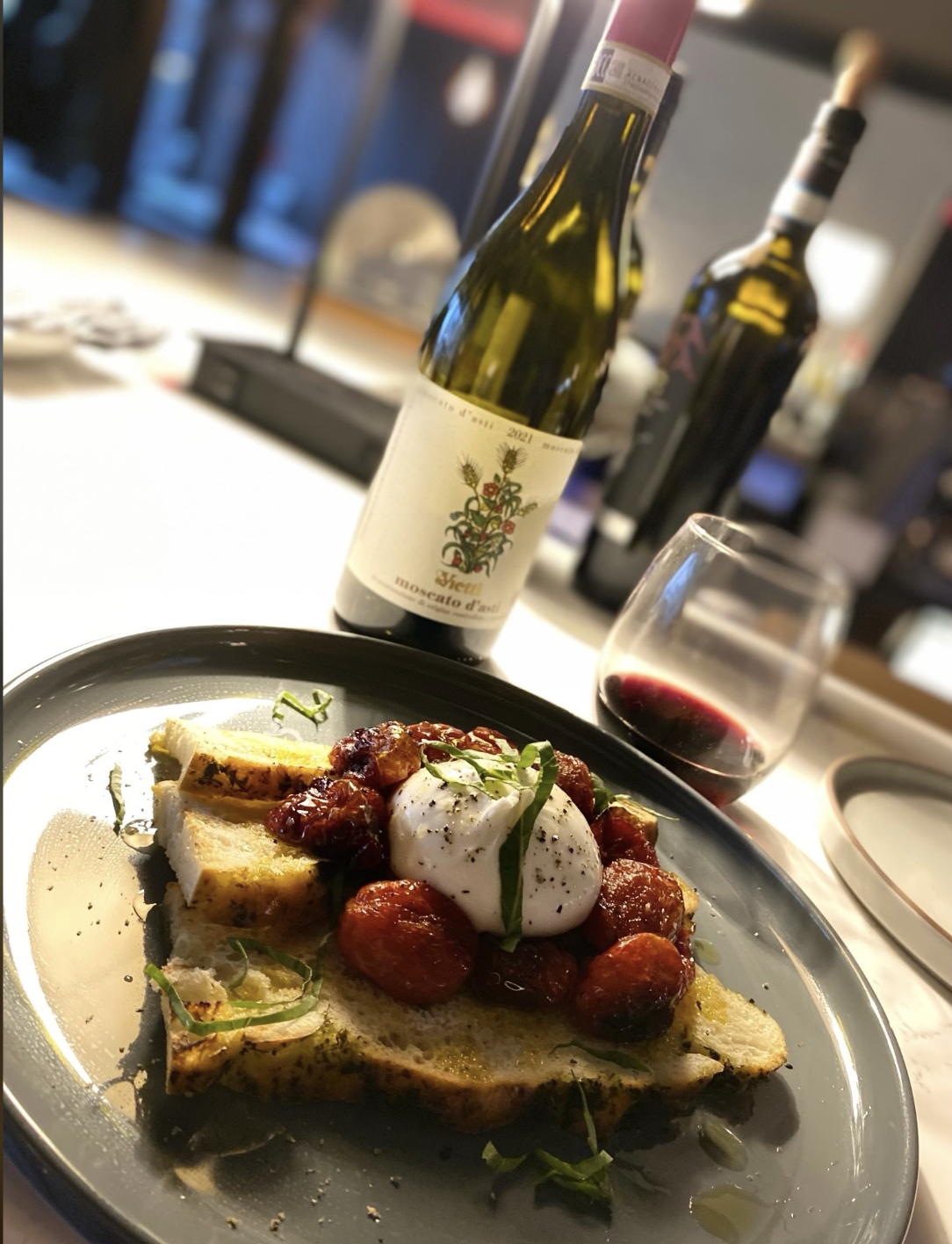 Osteria's grilled focaccia with roasted tomato confit.