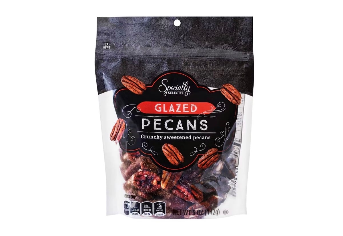 A bag of Specially Selected Glazed Pecans with images of pecans on the packaging. The label reads "Glazed Pecans: Crunchy sweetened pecans." The bag is resealable and has a clear window showing the pecans inside.
