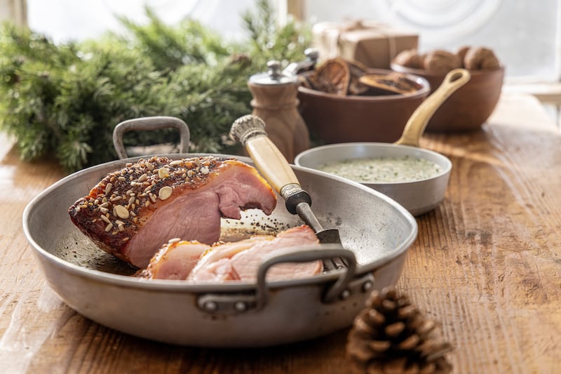 Honey-glazed loin of bacon with parsley and caper sauce. Photograph: Harry Weir