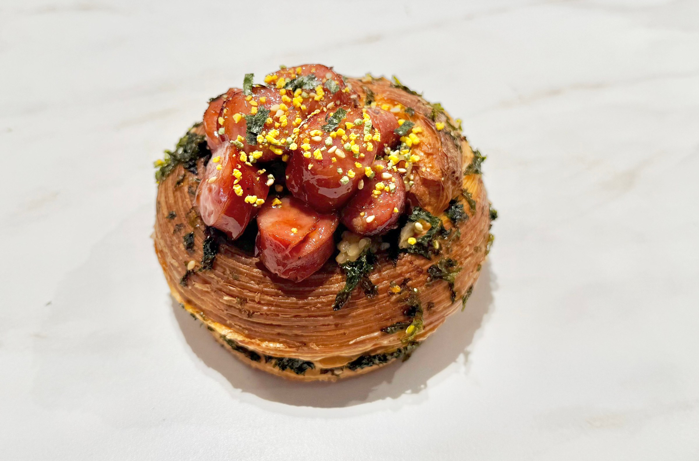 Papa d’Amour’s hot dog spiral combines sticky rice with laminated brioche