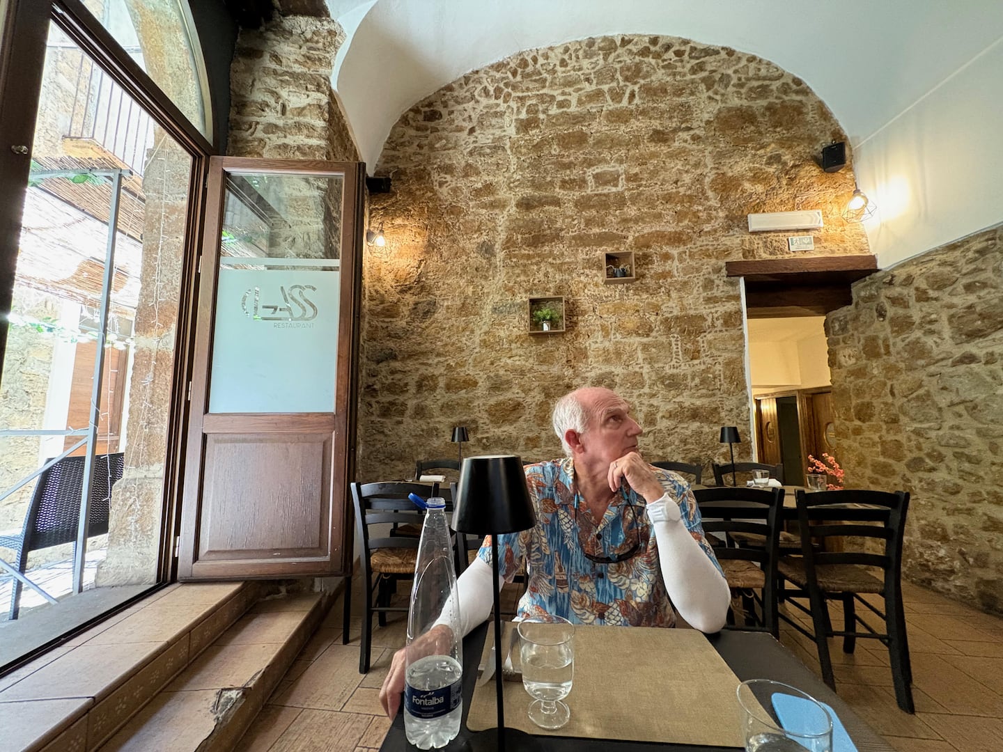 The cool interior of Glass, a restaurant serving typical Sicilian dishes and pizza in the hilltop town of Piazza Armerina.