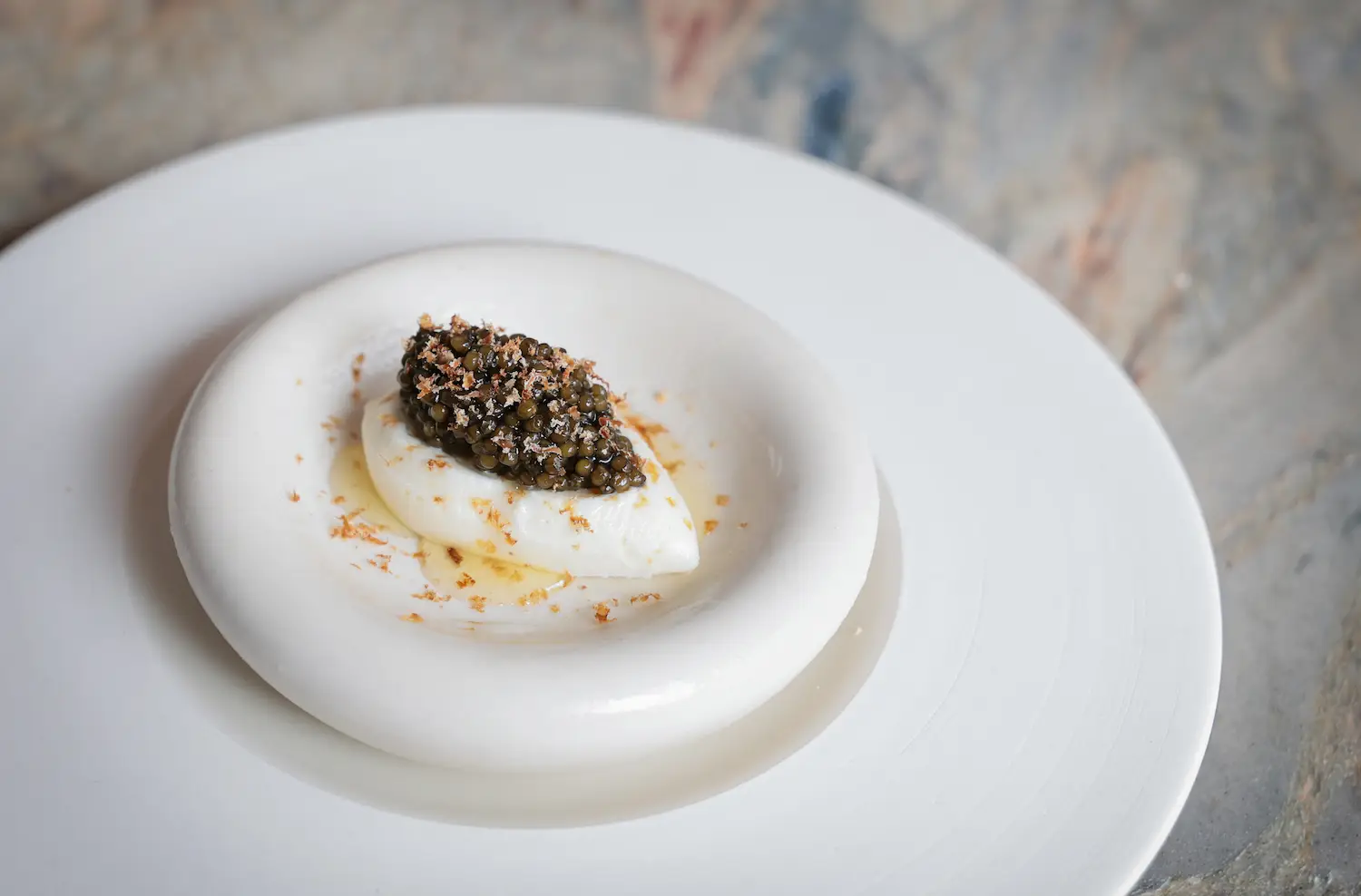 Food from new San Diego Michelin-starred restaurant Lilo in Carlsbad featuring their Ossetra Caviar