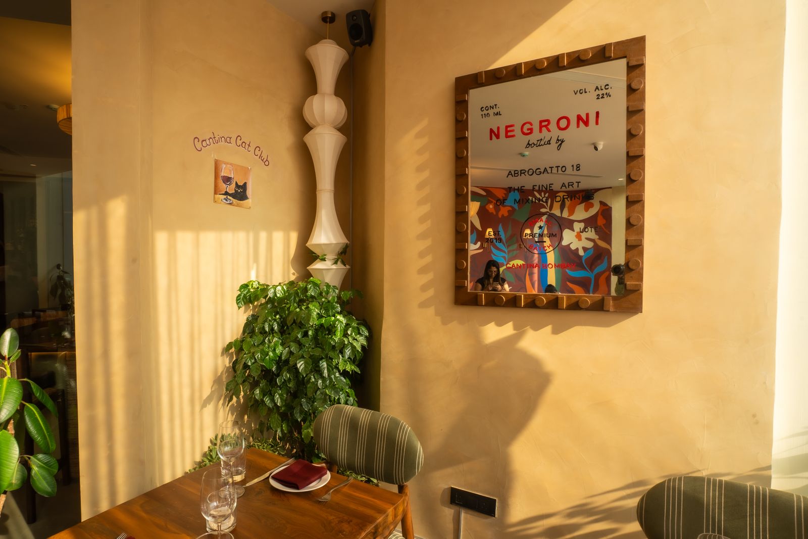 Image may contain Plant Potted Plant Indoors Interior Design Furniture Table Dining Table Cutlery and Fork