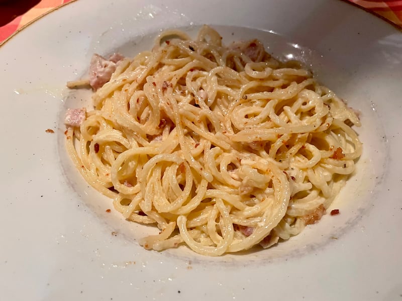 A plate of spaghetti carbonara