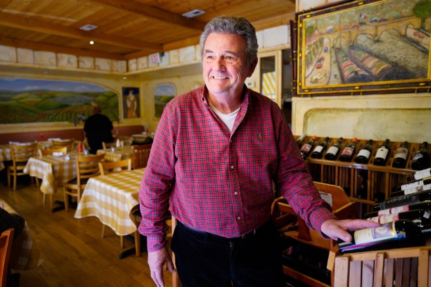 Michel Malecot, owner of The French Gourmet, says he plans on closing on January 4th, 2026.   (Nelvin C. Cepeda / The San Diego Union-Tribune)