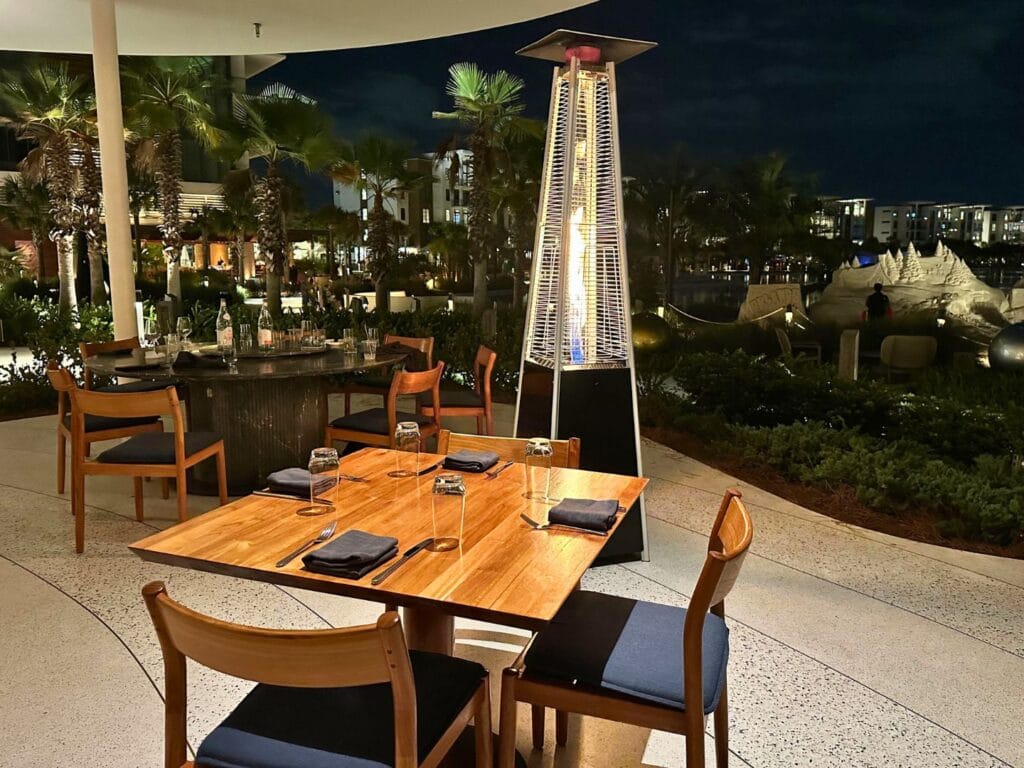 Sophia's Trattoria Outdoor Dining overlooks Conrad Orlando Nighttime Winter - image by Dani Meyering 