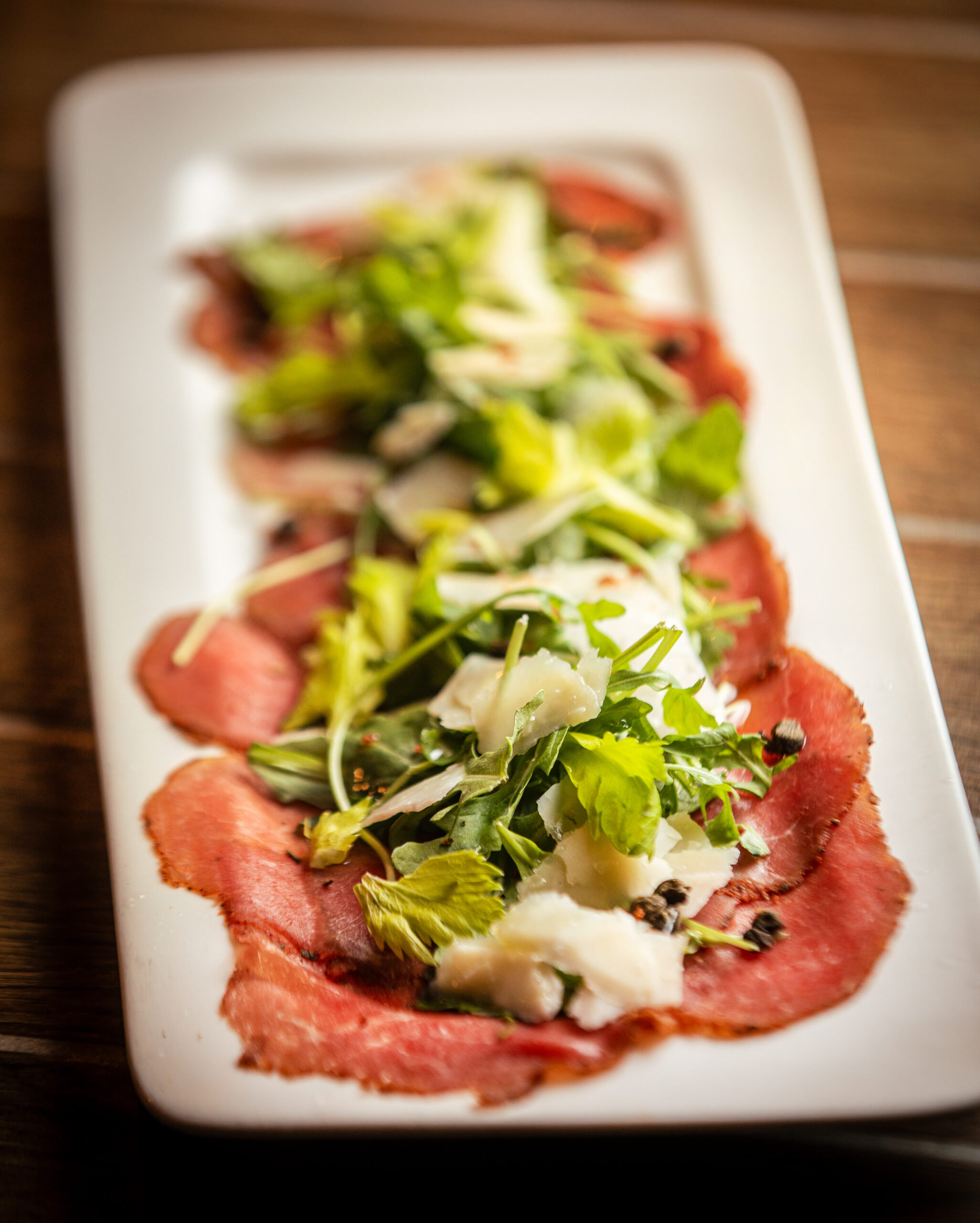 Beef Carpaccio with a house spice blend, sliced paper-thin & finished with arugula, parmesan & fried capers from Catelli’s Restaurant Sunday, Dec. 21, 2025 in Geyserville. (John Burgess / The Press Democrat)
