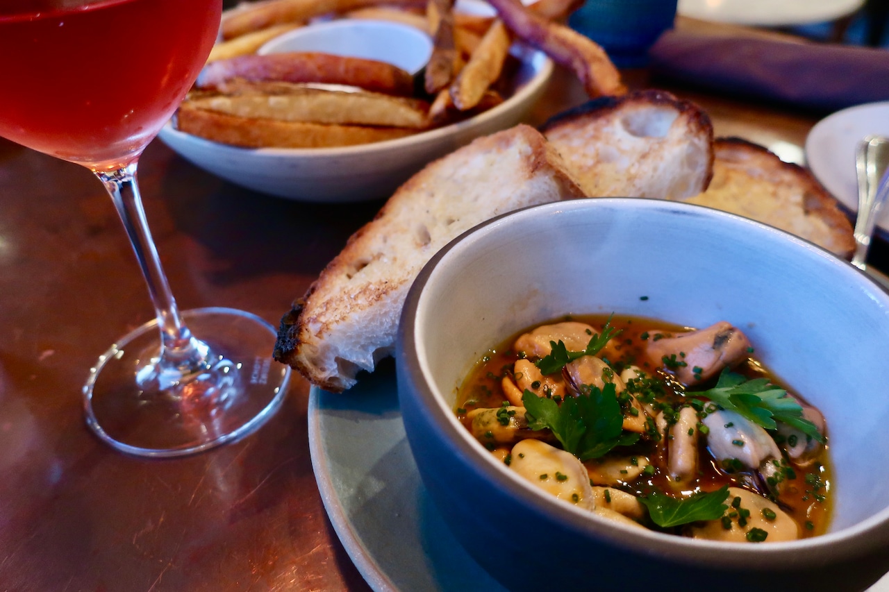 Mussels in a North African-spiced escabeche, golden French fries and a non-alcoholic rose spritz at Katy Jane's Oyster Bar.